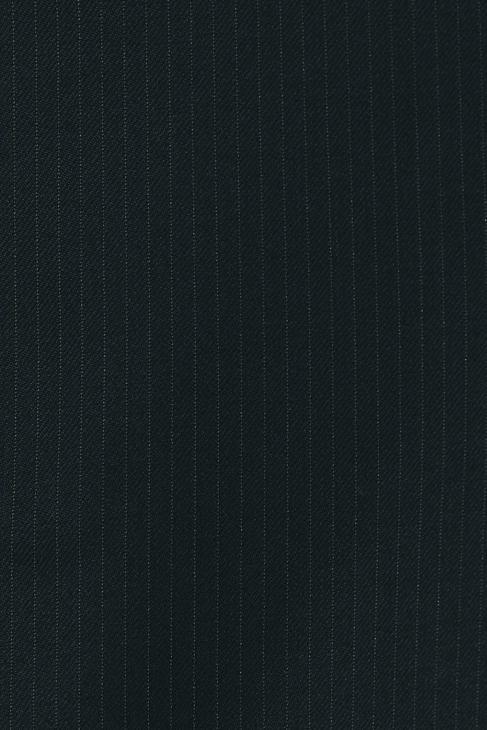Flat-fronted in navy pinstripe wool